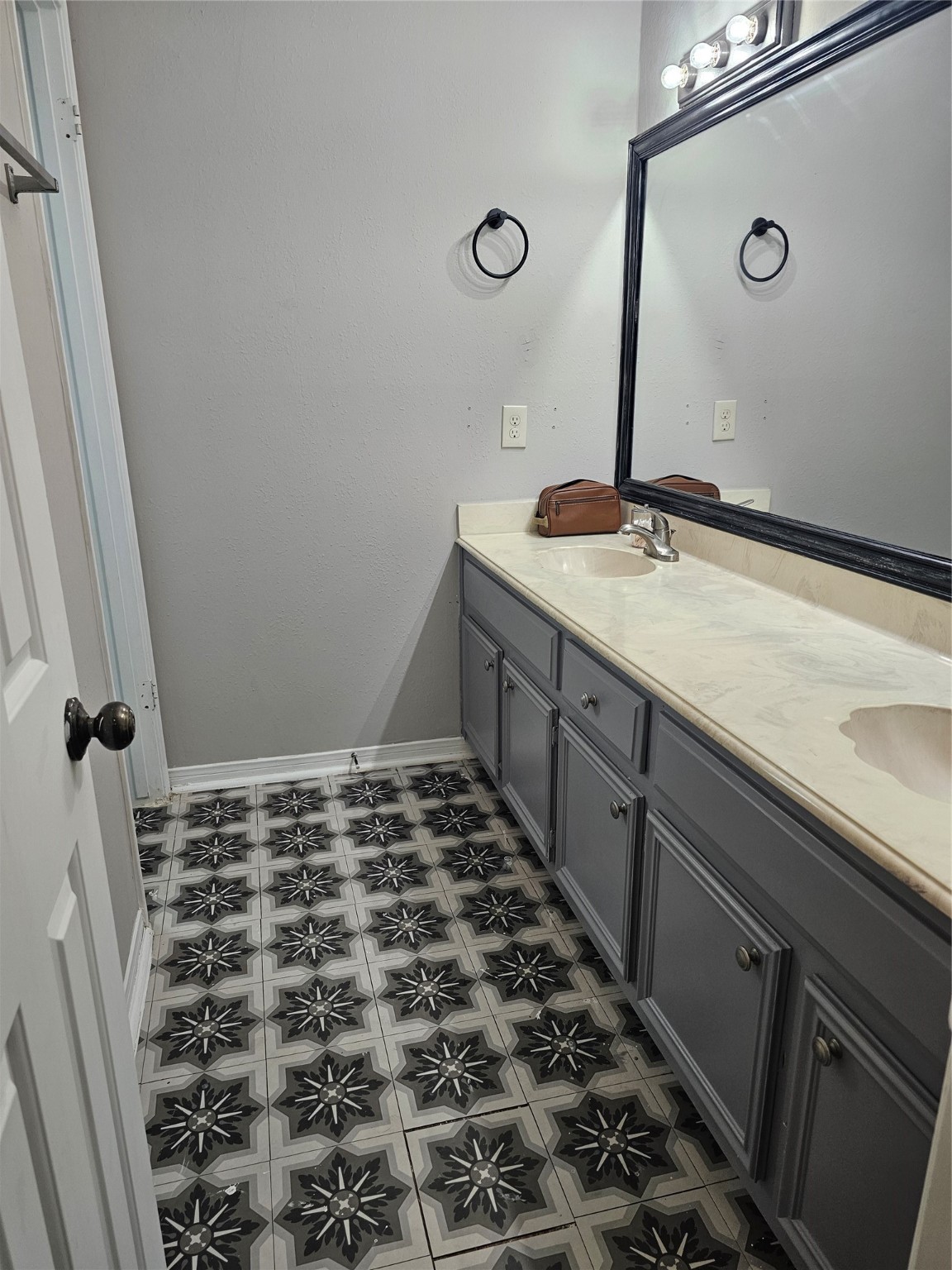 3710 Blue Lake Drive Spring, TX 77388 - Photo 10 of 15 a bathroom with a sink and a mirror