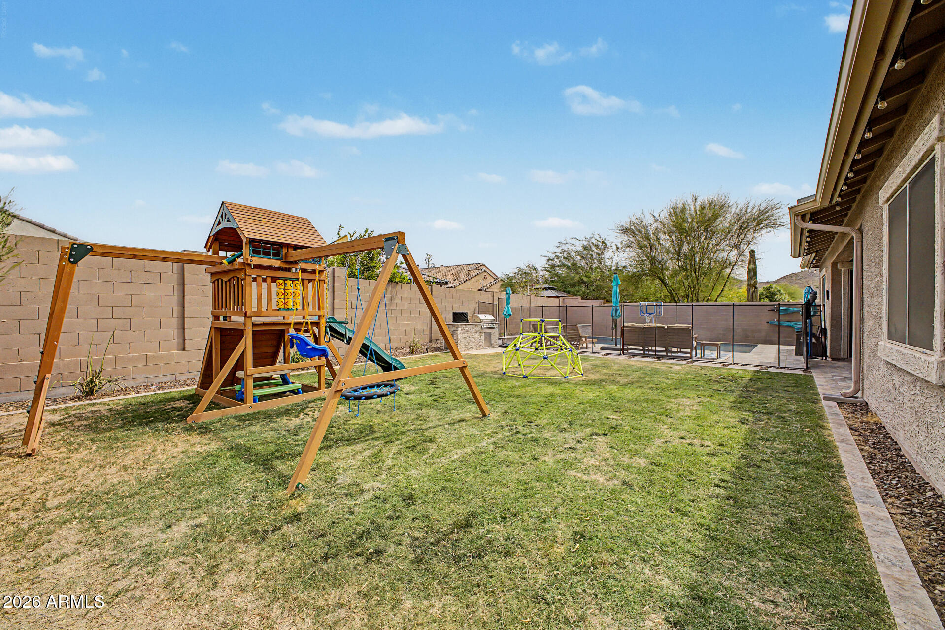 6511 West Steed Ridge Phoenix, AZ 85083 - Photo 36 of 41 a view of outdoor space with deck and flat screen tv