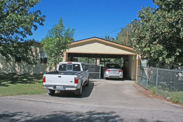 a car parked in front of house
