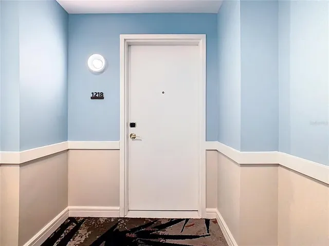 a kitchen with stainless steel appliances a refrigerator stove and microwave