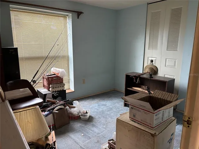 a room with furniture and a window