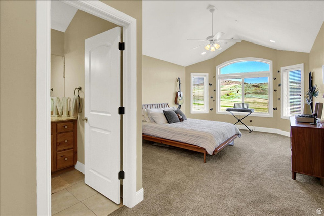 667 Hardscrabble Road Morgan, UT 84050 - Photo 32 of 51 North Upstairs Bedroom with light carpet, ceiling fan, and light tile patterned flooring