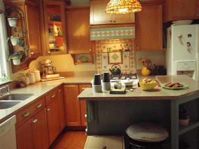 1685 Bridge Road Eastham, MA 02642 - Photo 10 of 22 a kitchen with a sink and cabinets