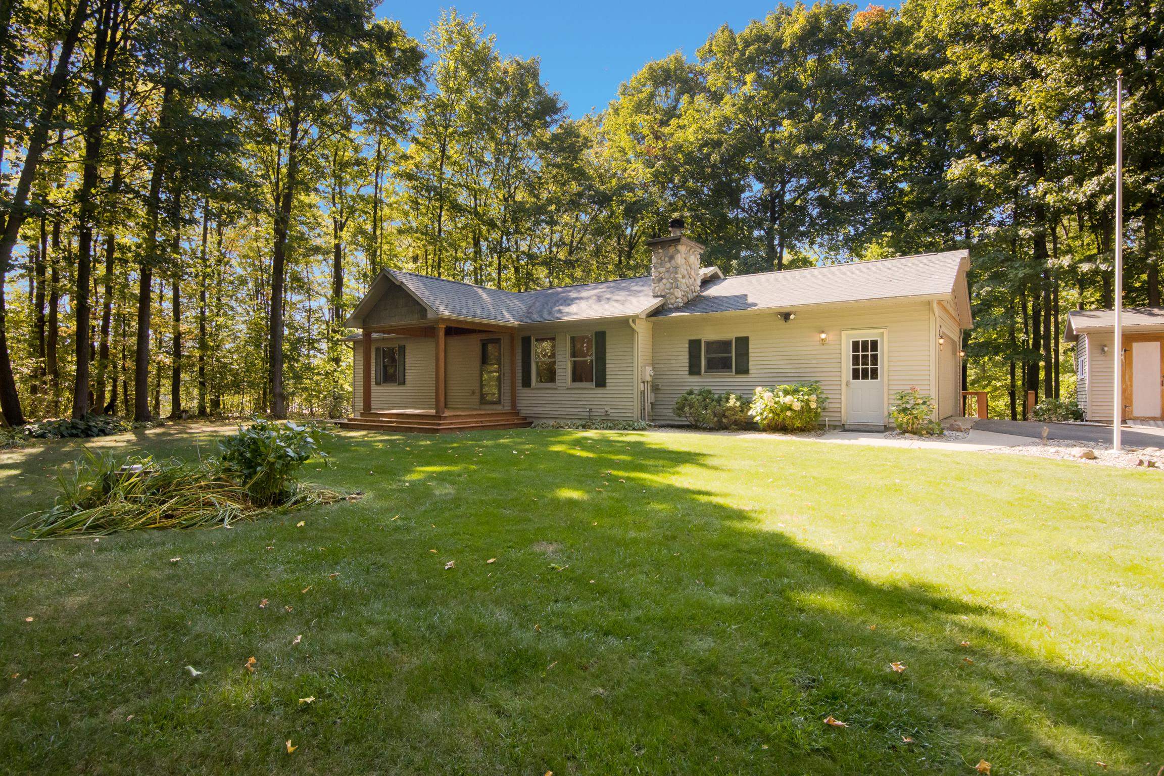 1687 Rasho Road Traverse City, MI 49696 - Photo 1 of 27 1927413-e3b19f44-db4e-46e3-8161-9a27e2319f14.JPG