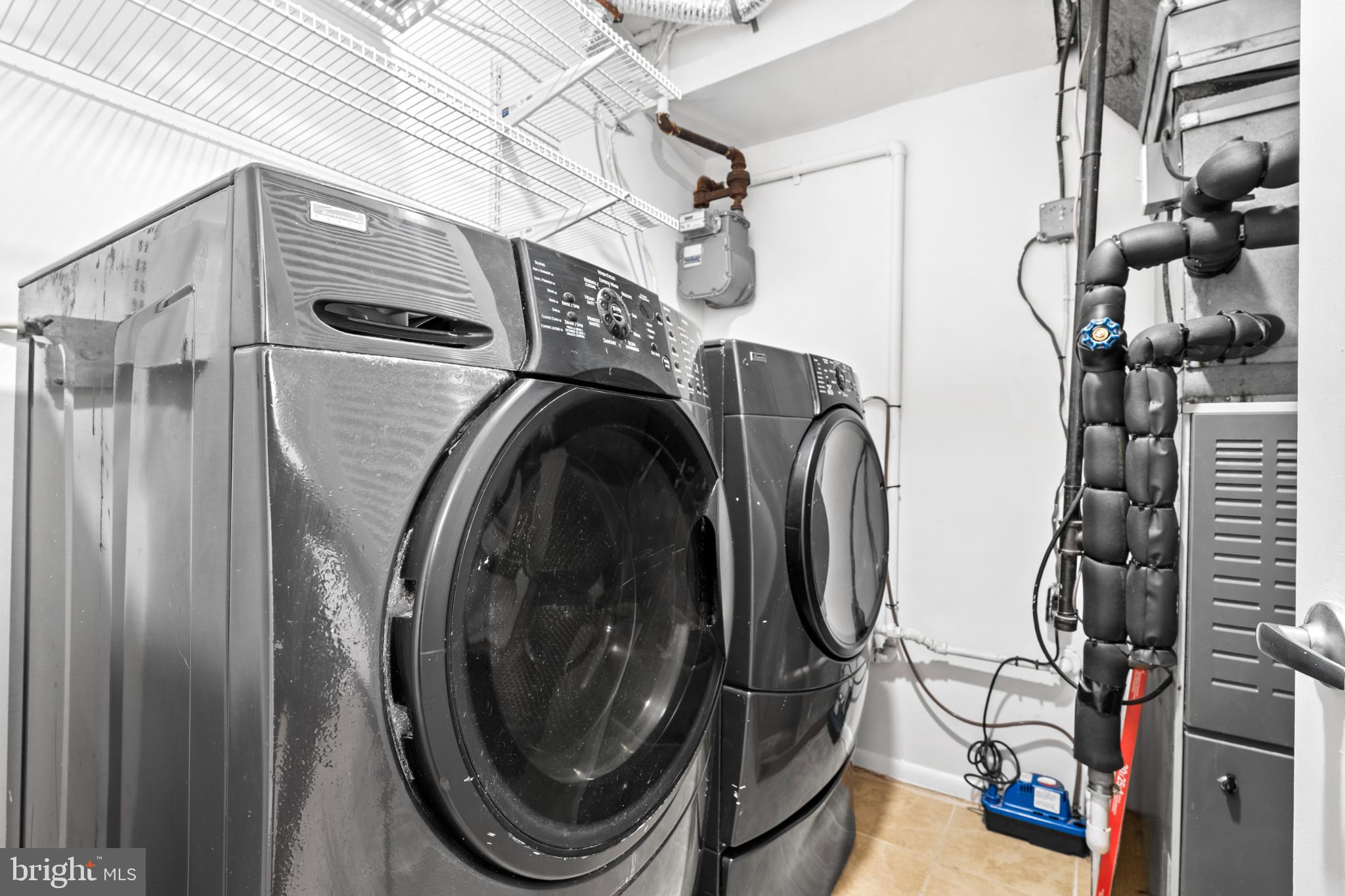 73 G Street Southwest, Unit 103 Washington, DC 20024 - Photo 10 of 35 a utility room with dryer and washer