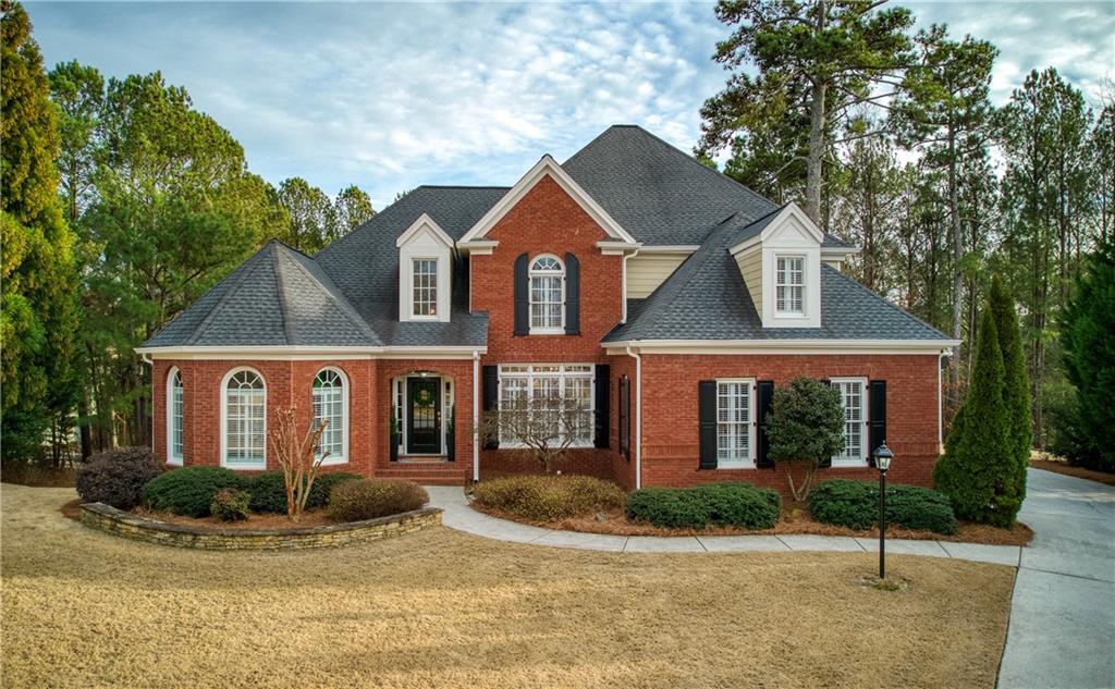 1015 Signal Point Alpharetta, GA 30005 - Photo 1 of 1 Live the lifestyle you've dreamed of in this 3 1/2 sided BRICK TRADITIONAL in the ideal location within WINDWARD. Please visit www.1015SignalPointe.com for more details.