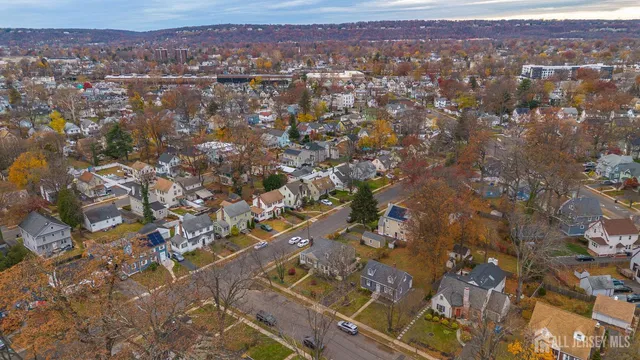 an aerial view of residential building with parking space