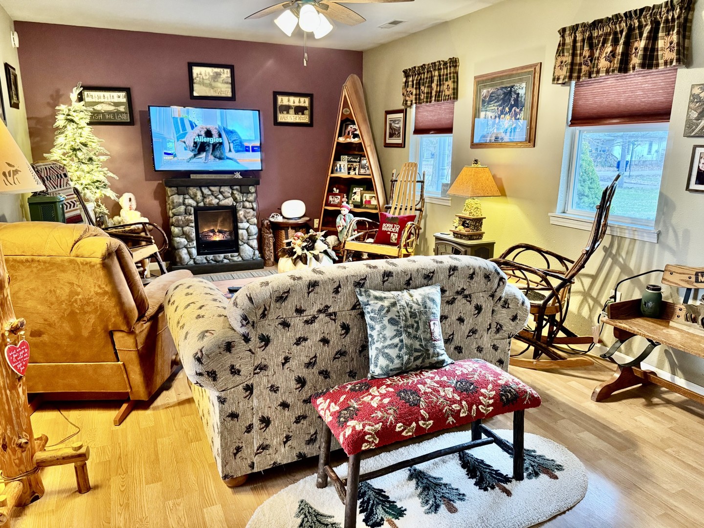 406 Edwards Street Granville, IL 61326 - Photo 4 of 13 a living room with furniture a rug and a flat screen tv