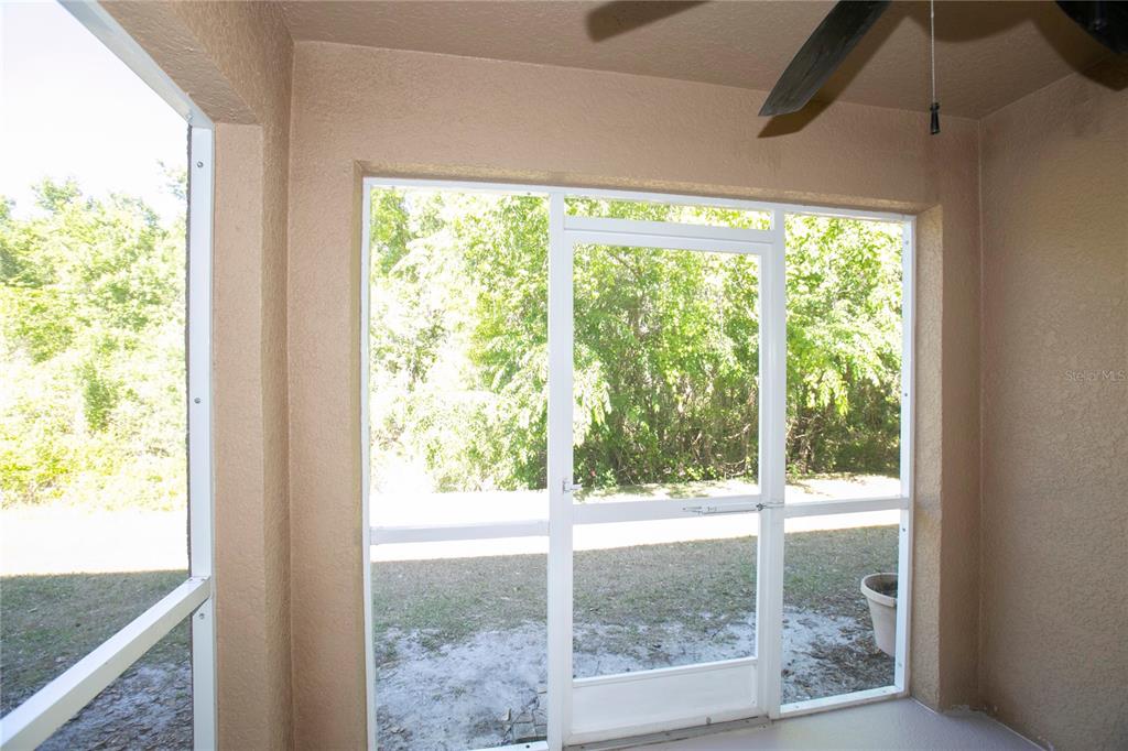11919 Essington Street New Port Richey, FL 34654 - Photo 10 of 46 a view of a room with a large window