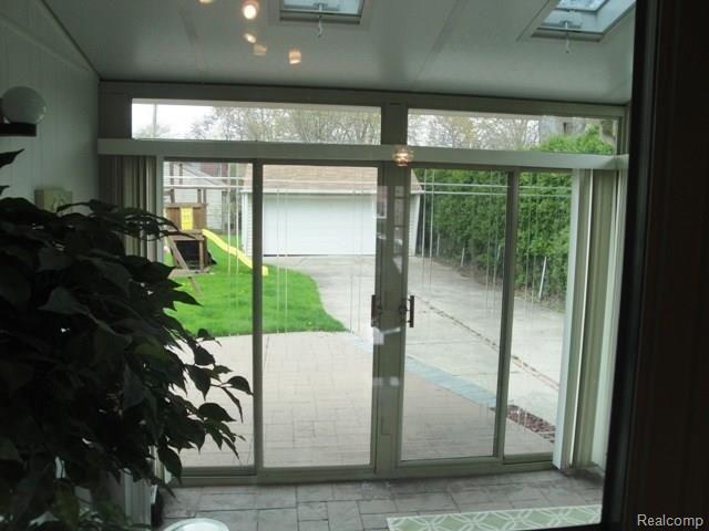 1932 Broadstone Road Grosse Pointe, MI 48236 - Photo 20 of 22 Sunroom to Backyard