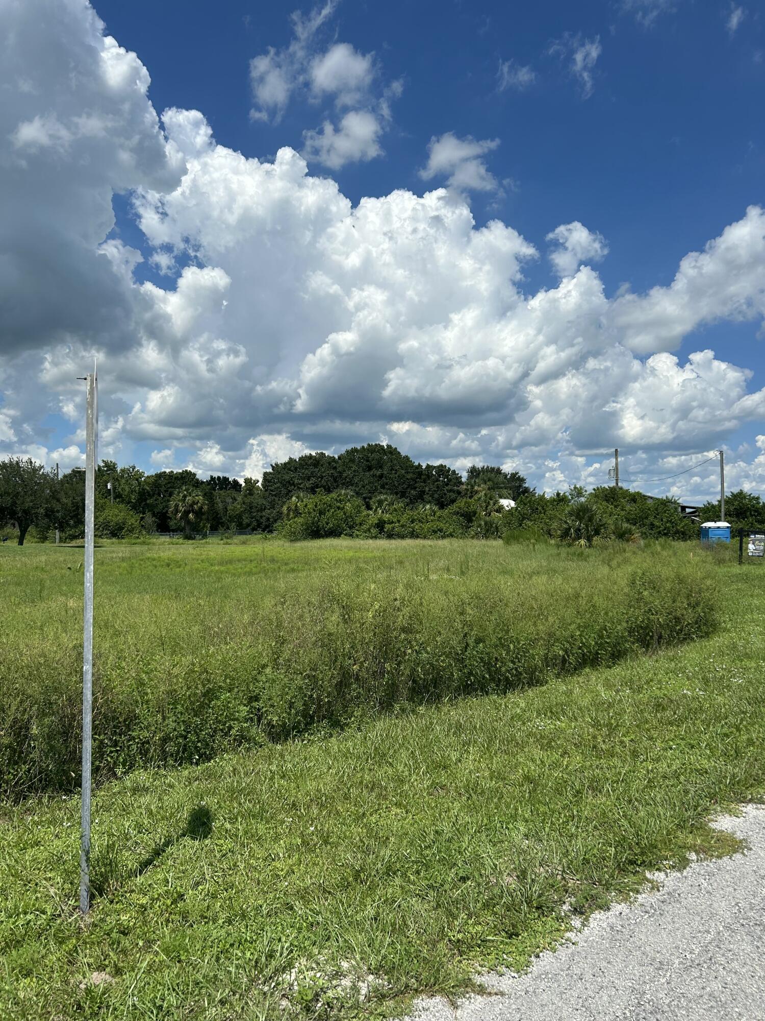 a view of a golf course with a lake