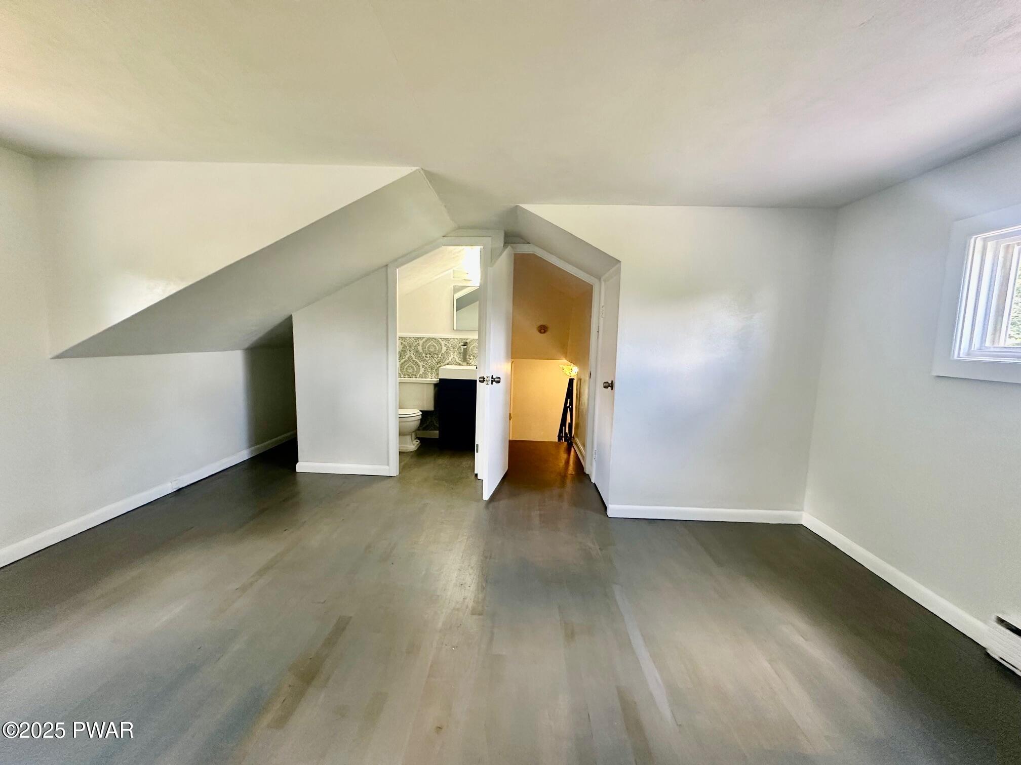 191 Hemlock Grove Road Greentown, PA 18426 - Photo 29 of 31 a view of empty room with wooden floor and window