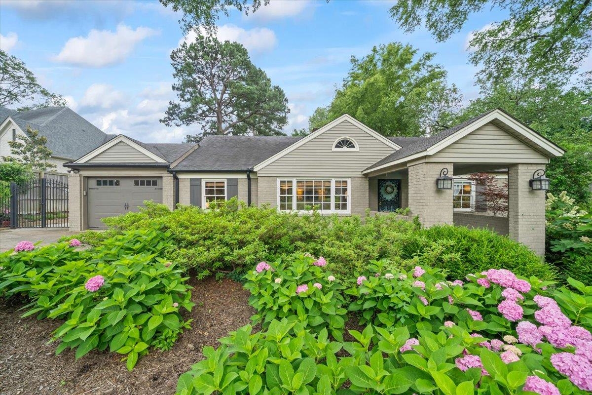 5283 Cole Road Memphis, TN 38120 - Photo 2 of 35 a front view of a house with a yard