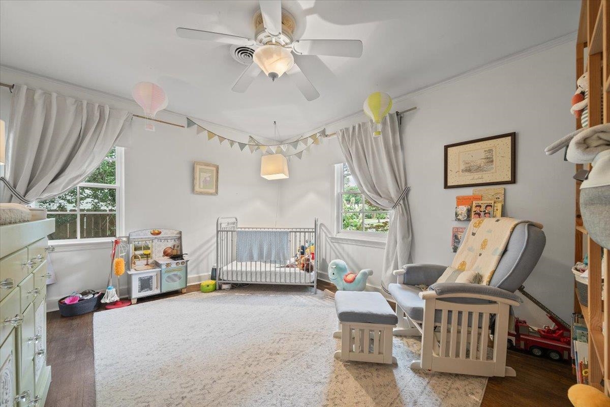 5283 Cole Road Memphis, TN 38120 - Photo 24 of 35 a bedroom with furniture and a window