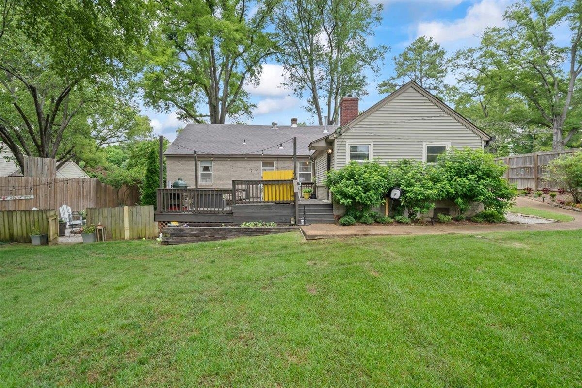 5283 Cole Road Memphis, TN 38120 - Photo 29 of 35 a front view of a house with a yard