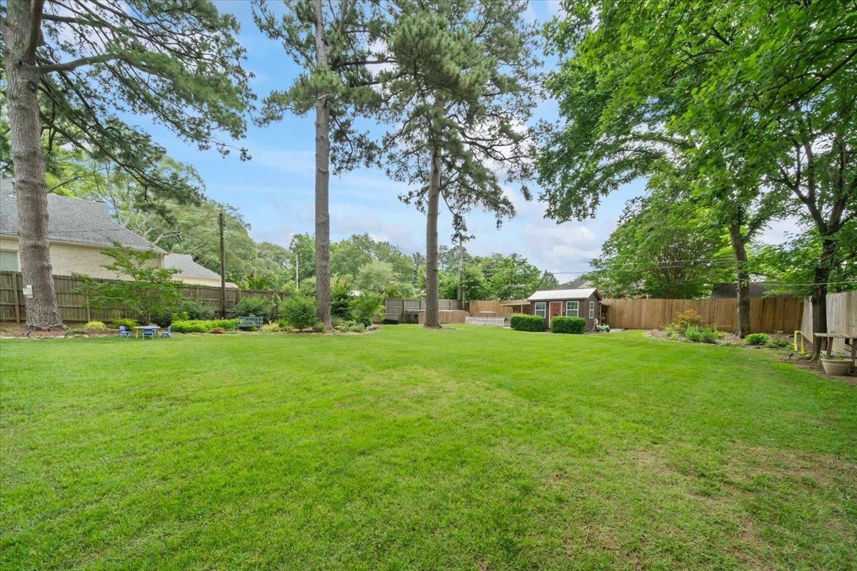 5283 Cole Road Memphis, TN 38120 - Photo 31 of 35 a view of a backyard with sitting area