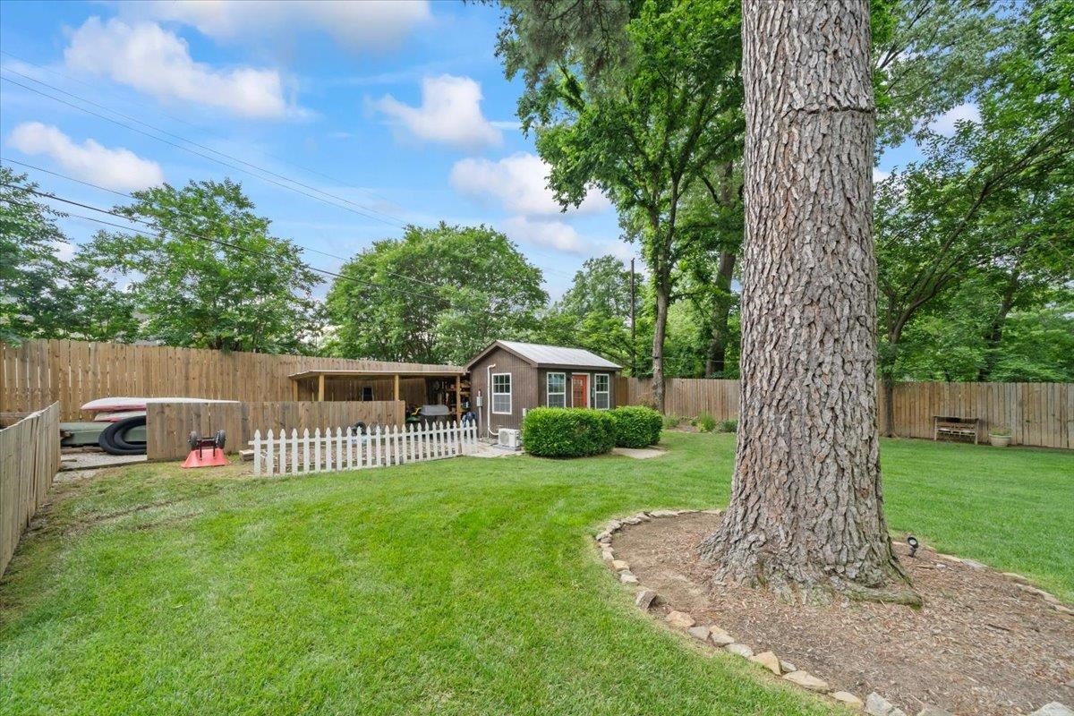 5283 Cole Road Memphis, TN 38120 - Photo 34 of 35 a front view of a house with garden