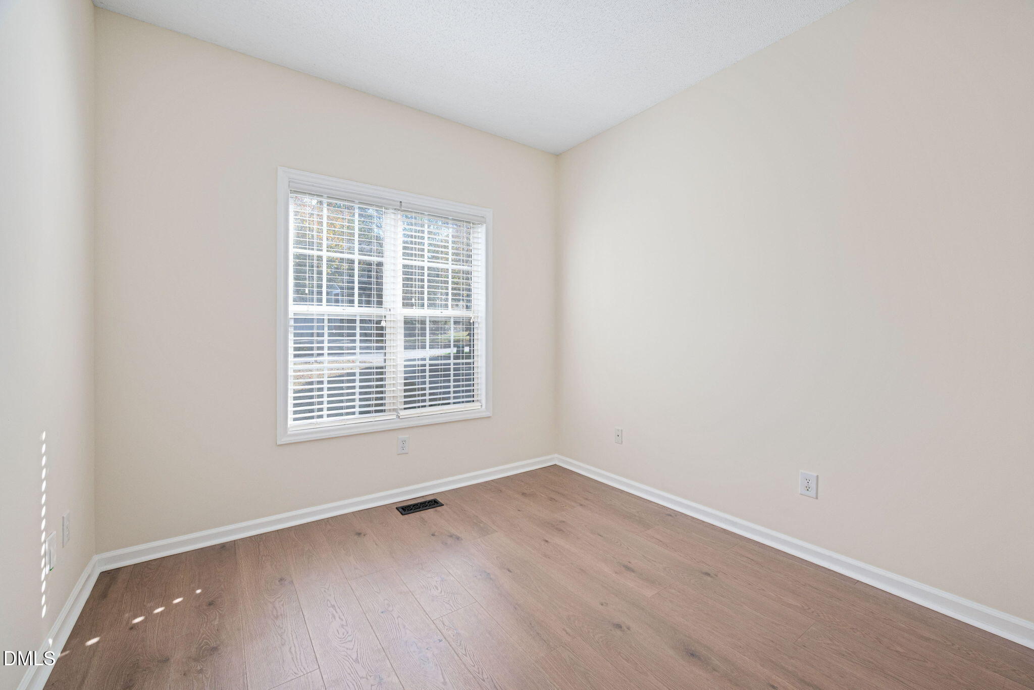 2524 Beech Gap Court Raleigh, NC 27603 - Photo 24 of 31 an empty room with a window