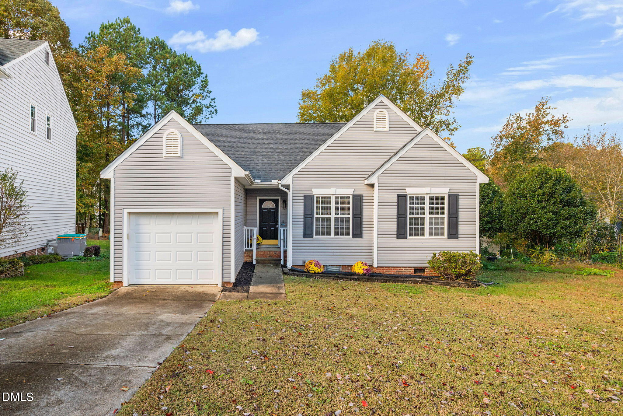 2524 Beech Gap Court Raleigh, NC 27603 - Photo 2 of 31 a view of a house with a yard and large tree