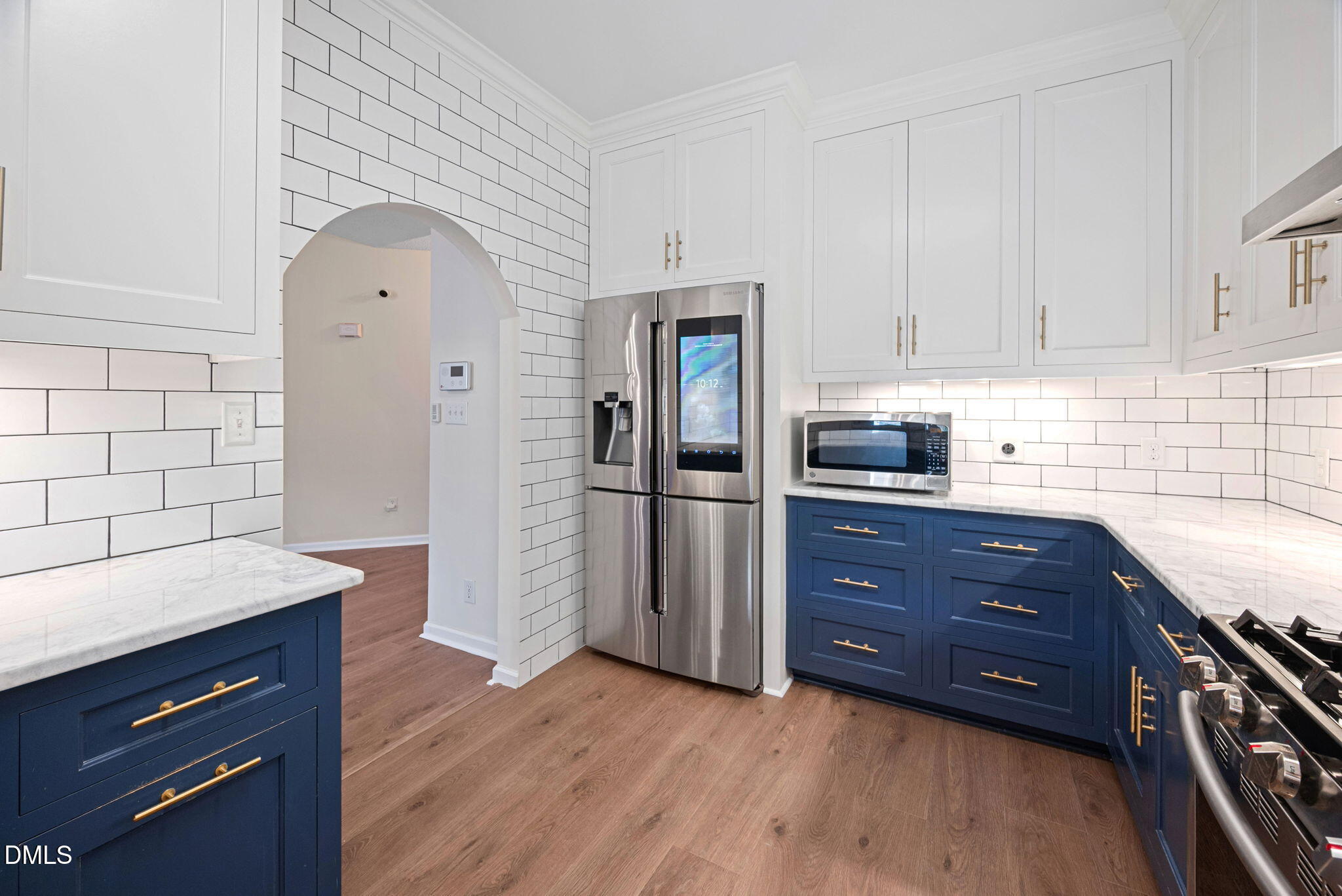 2524 Beech Gap Court Raleigh, NC 27603 - Photo 8 of 31 a kitchen with stainless steel appliances granite countertop a refrigerator and a stove top oven