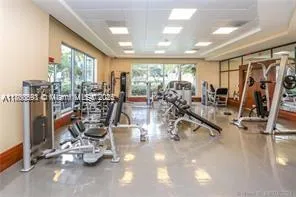 a swimming pool with outdoor seating and yard