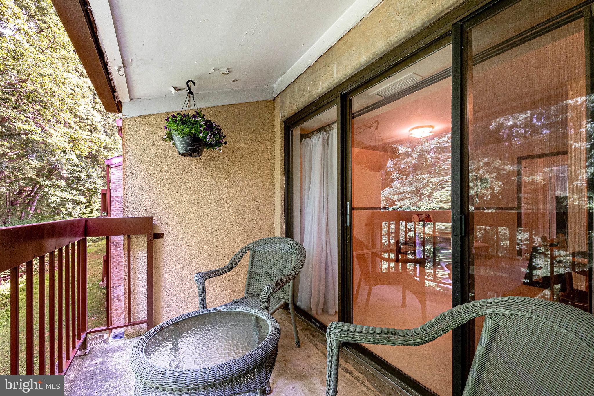 11621 Stoneview Square, Unit 22C Reston, VA 20191 - Photo 32 of 37 Back Deck with dining Room Access