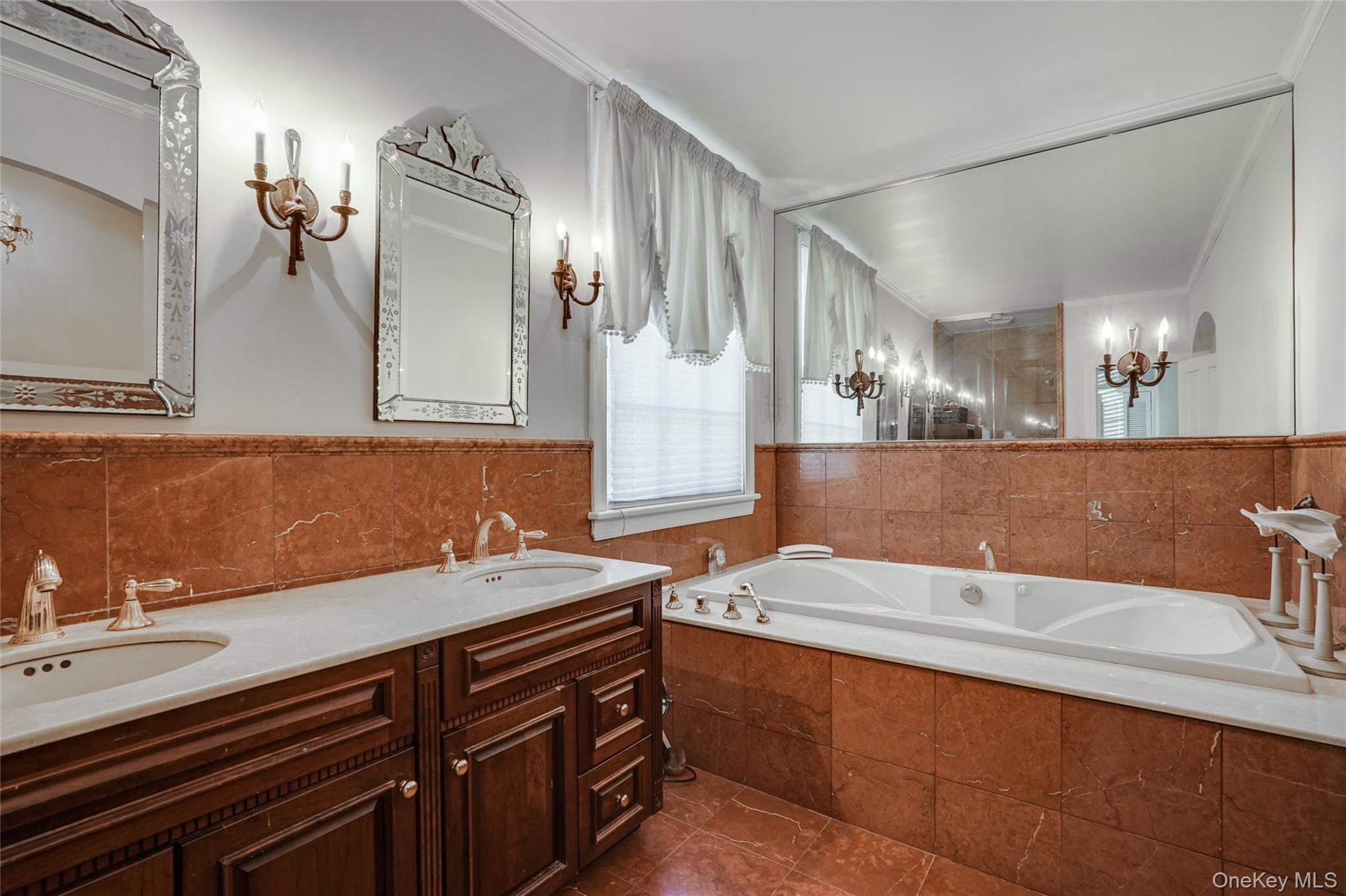 274 River Road St. James, NY 11780 - Photo 16 of 30 a bathroom with a sink and a mirror