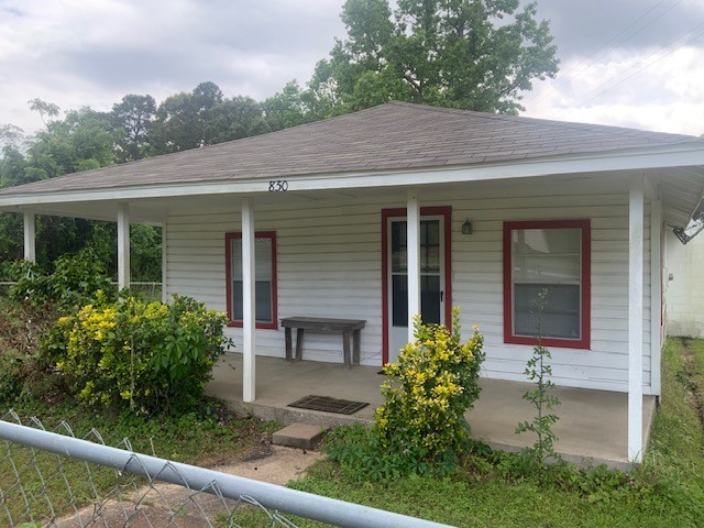850 Slade Street Coldspring, TX 77331 - Photo 2 of 30 Front features a covered porch
