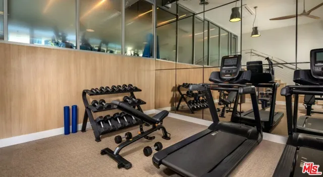 a view of a workspace with furniture