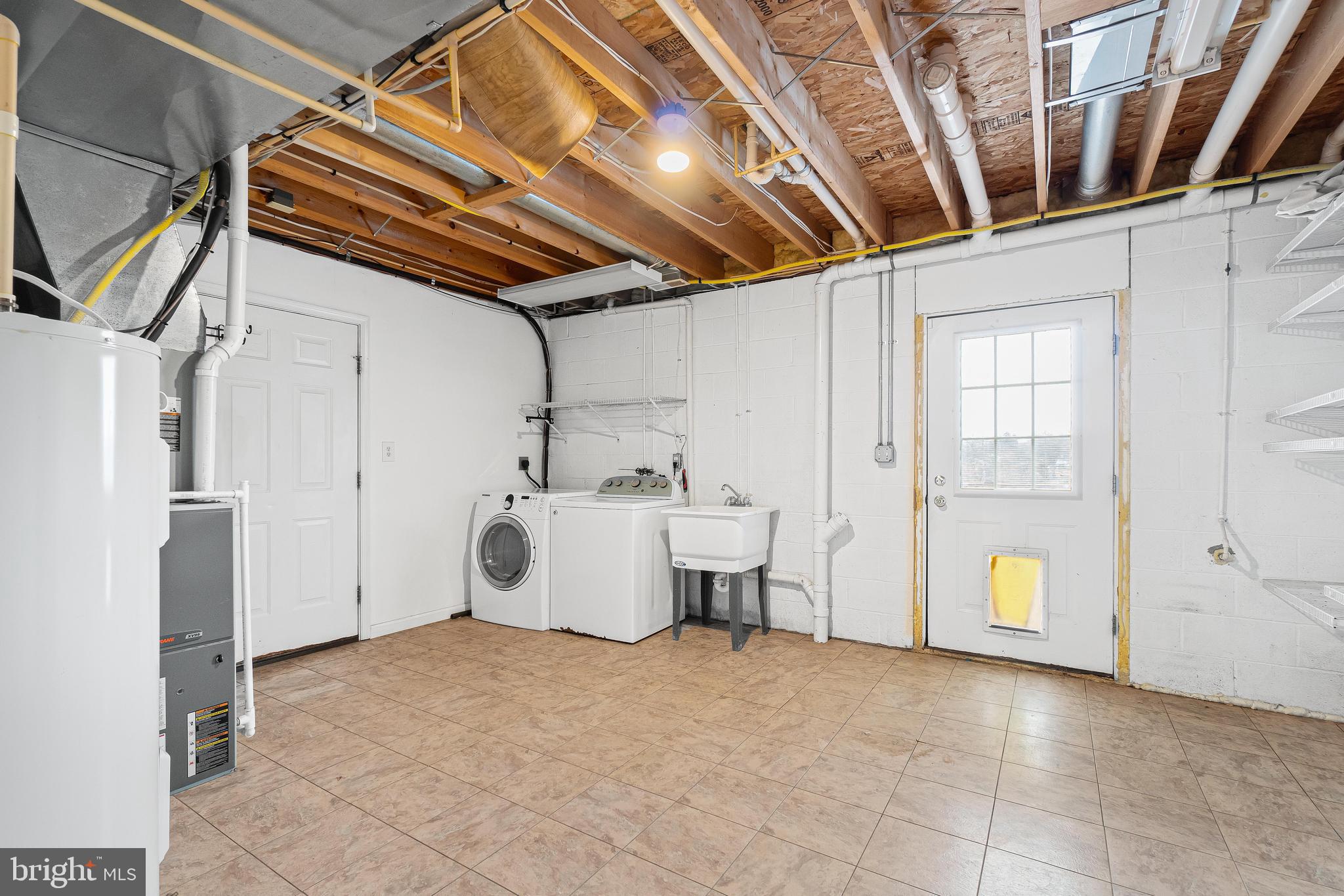 105 Little Brick Court Rising Sun, MD 21911 - Photo 27 of 27 huge laundry with access to garage and backyard!
