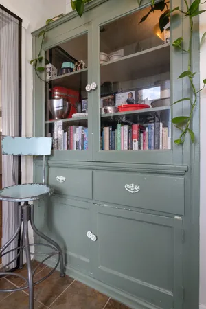 a view of a livingroom with furniture window and wooden floor