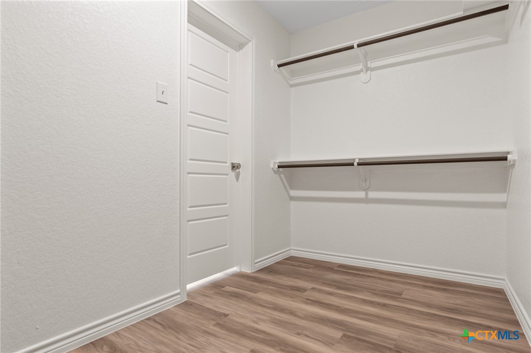 1204 Victory Ranch Trail Killeen, TX 76549 - Photo 18 of 33 a view of an empty walk in closet