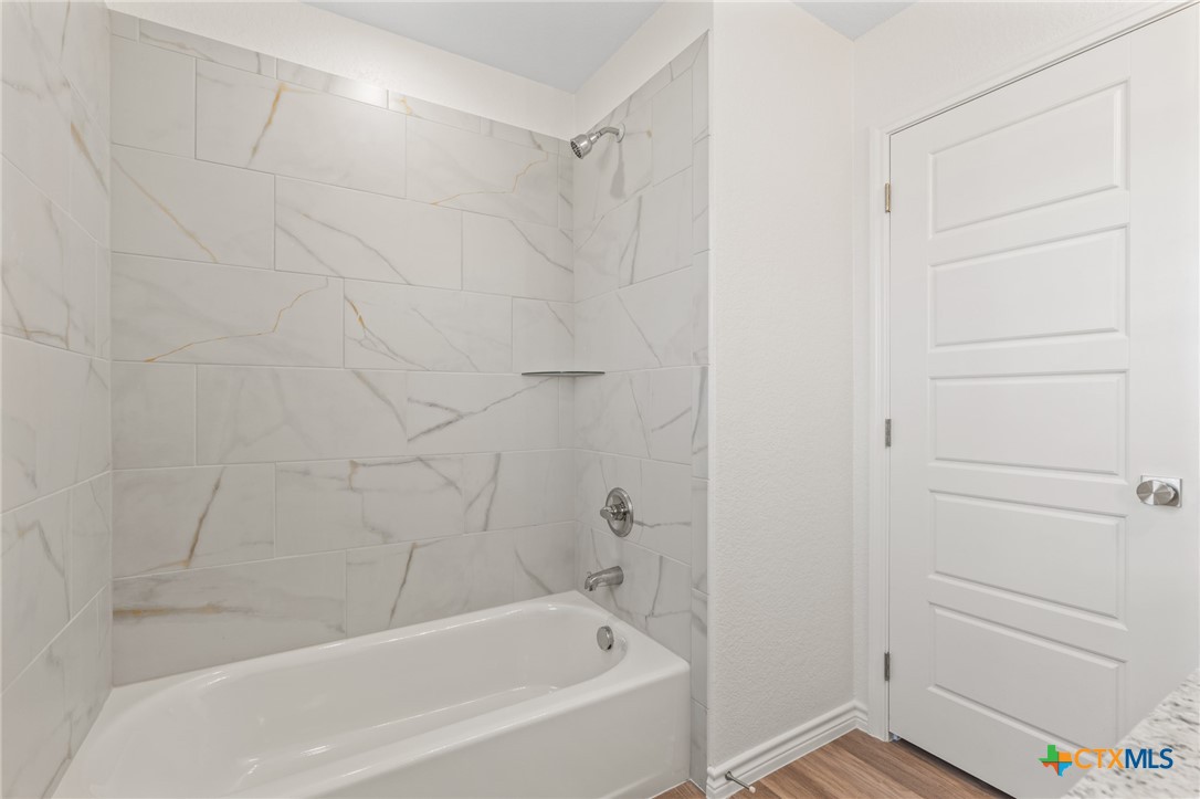 1204 Victory Ranch Trail Killeen, TX 76549 - Photo 25 of 33 a bathroom with a bathtub