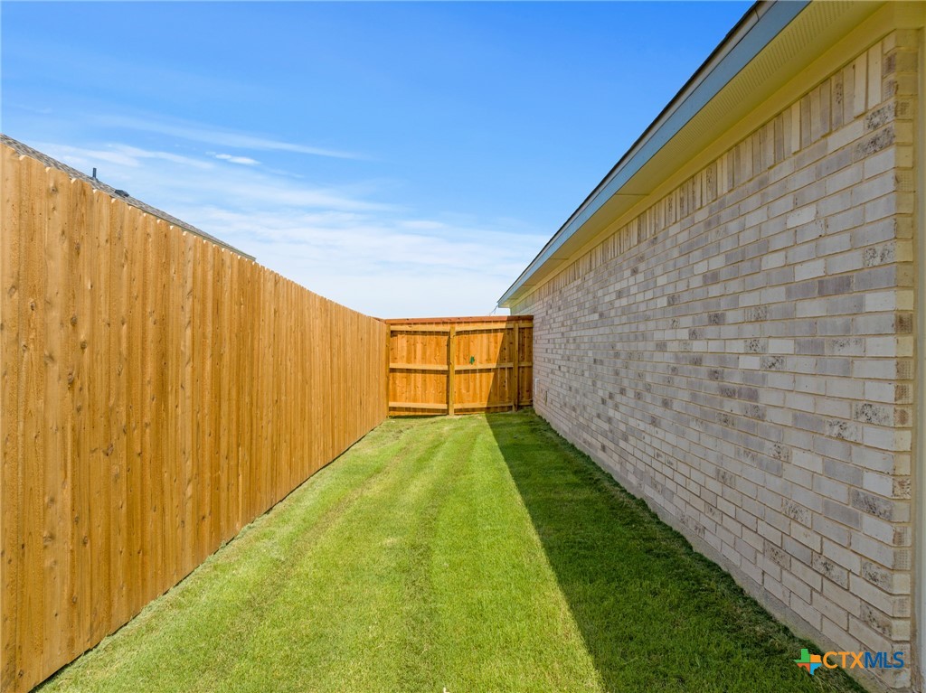 1204 Victory Ranch Trail Killeen, TX 76549 - Photo 29 of 33 a view of backyard with tub