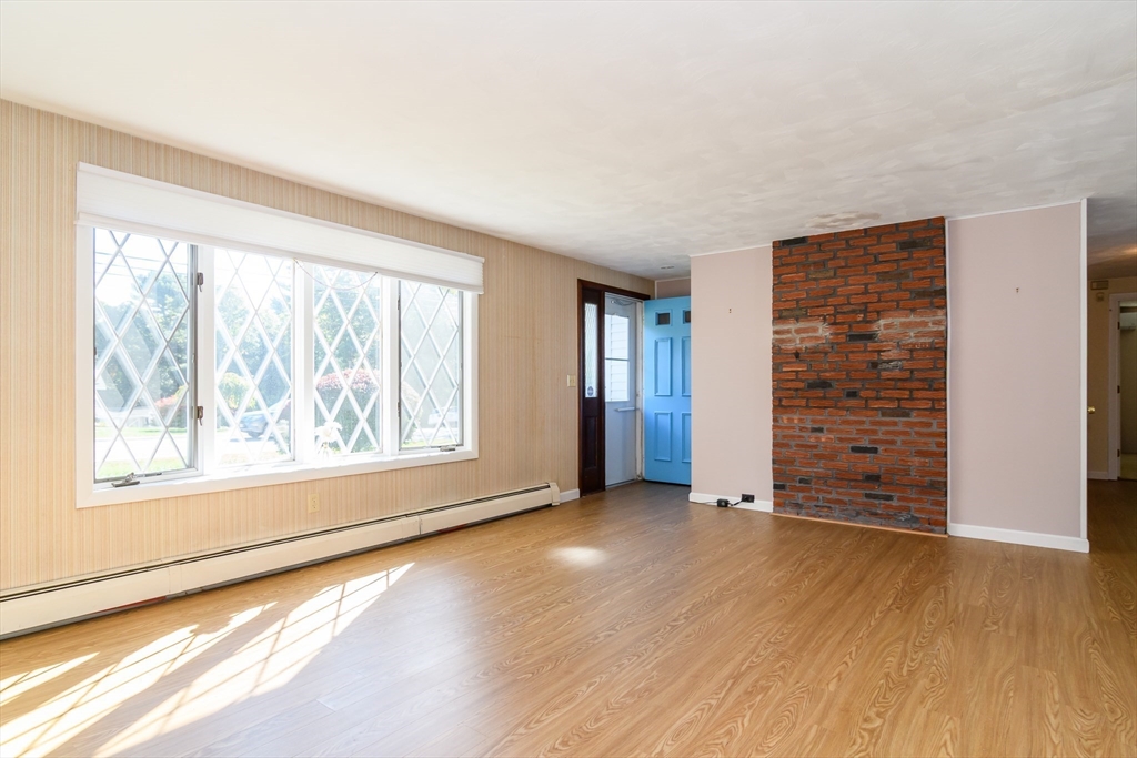 440 County Road Bourne, MA 02559 - Photo 16 of 27 a view of an empty room with wooden floor and a window
