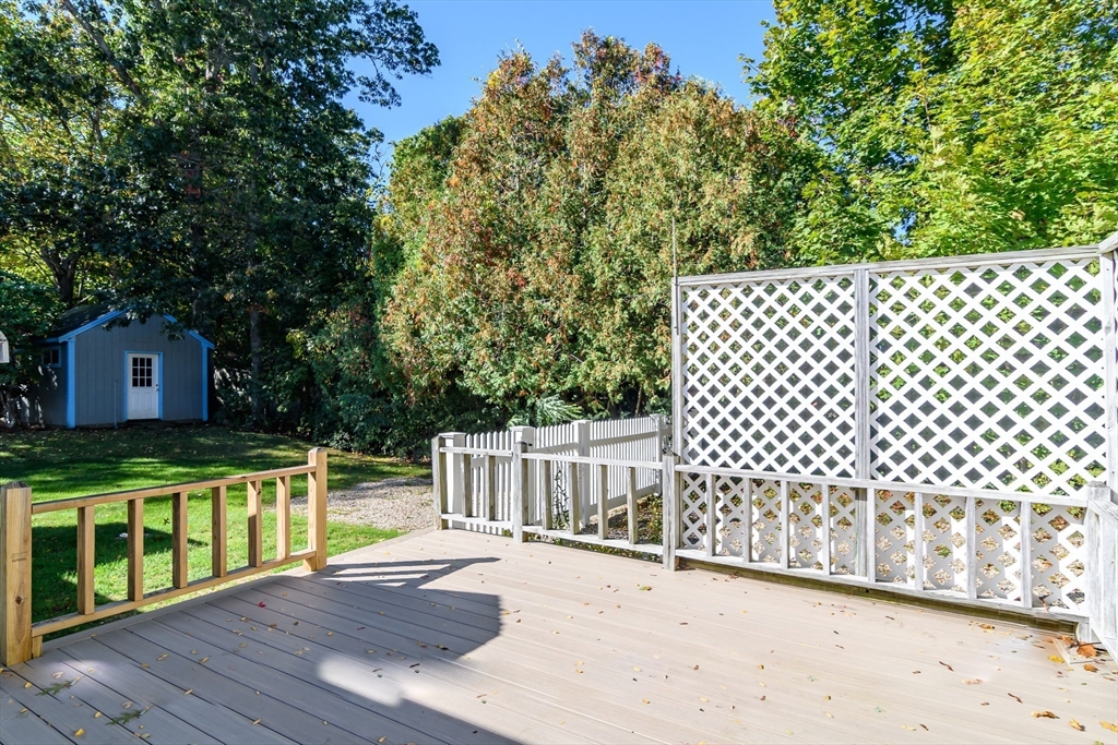 440 County Road Bourne, MA 02559 - Photo 2 of 27 a view of a deck with wooden floor and fence