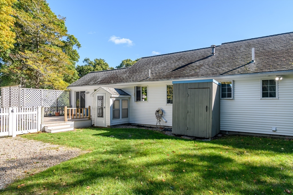 440 County Road Bourne, MA 02559 - Photo 5 of 27 a view of a house with a yard and sitting area