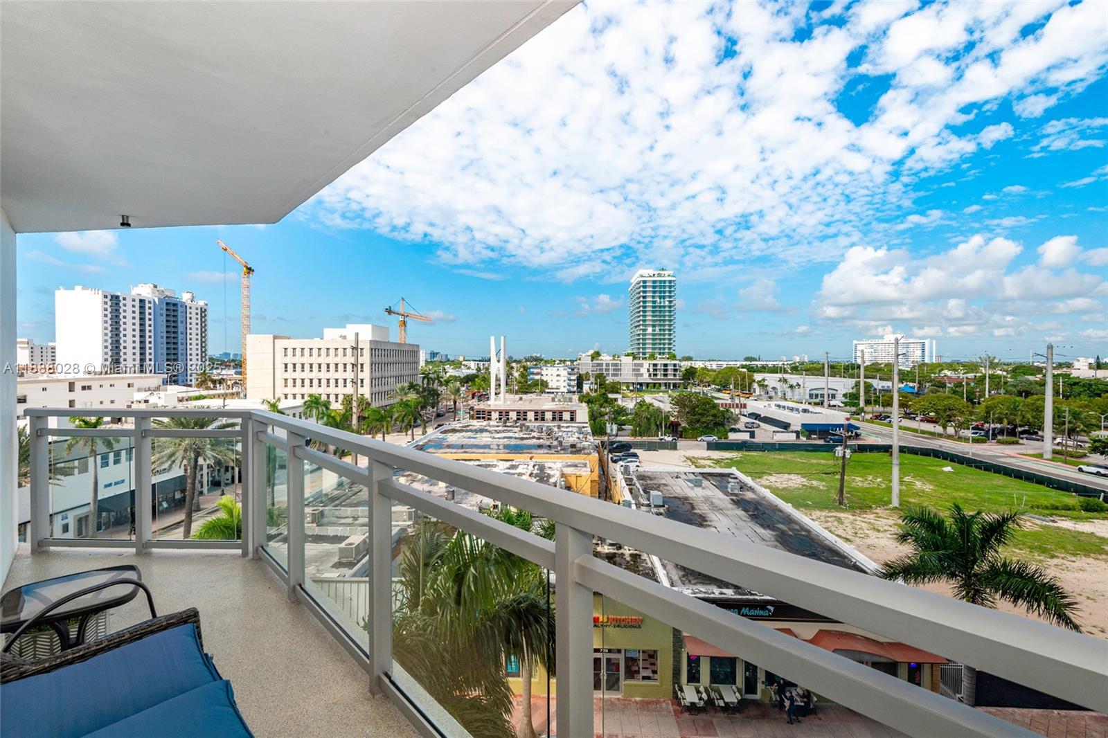 a view of swimming pool with outdoor seating