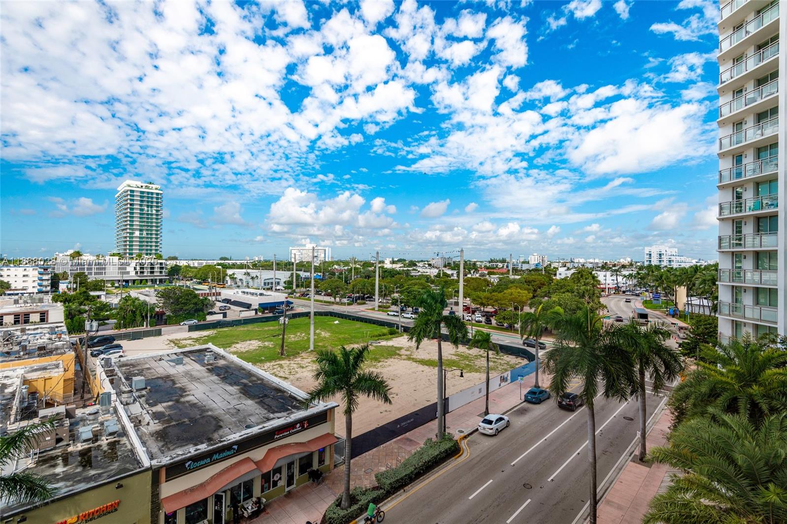 7135 Collins Avenue, Unit 625 Miami Beach, FL 33141 - Photo 2 of 33 a view of a swimming pool with a patio