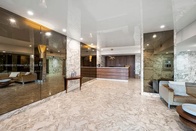 a view of lobby with livingroom and furniture