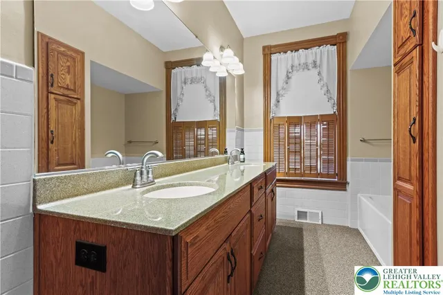 a bathroom with a toilet and a sink