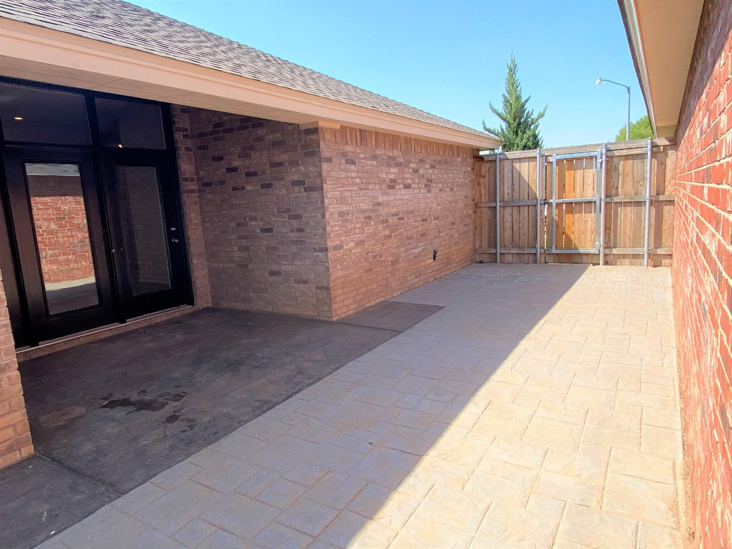 6521 8th Street Lubbock, TX 79416 - Photo 23 of 25 a view of a house with a garage