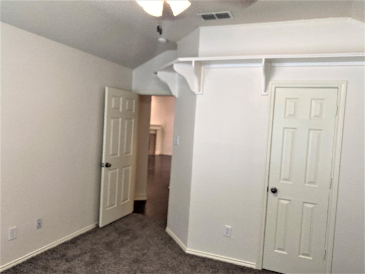 6521 8th Street Lubbock, TX 79416 - Photo 5 of 25 a view of a room with closet