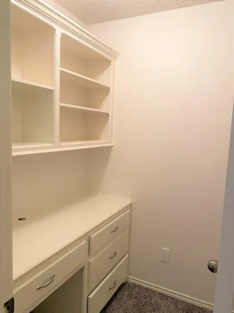 a view of storage area with empty racks