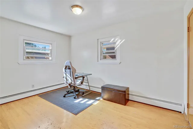 a view of a workspace with furniture