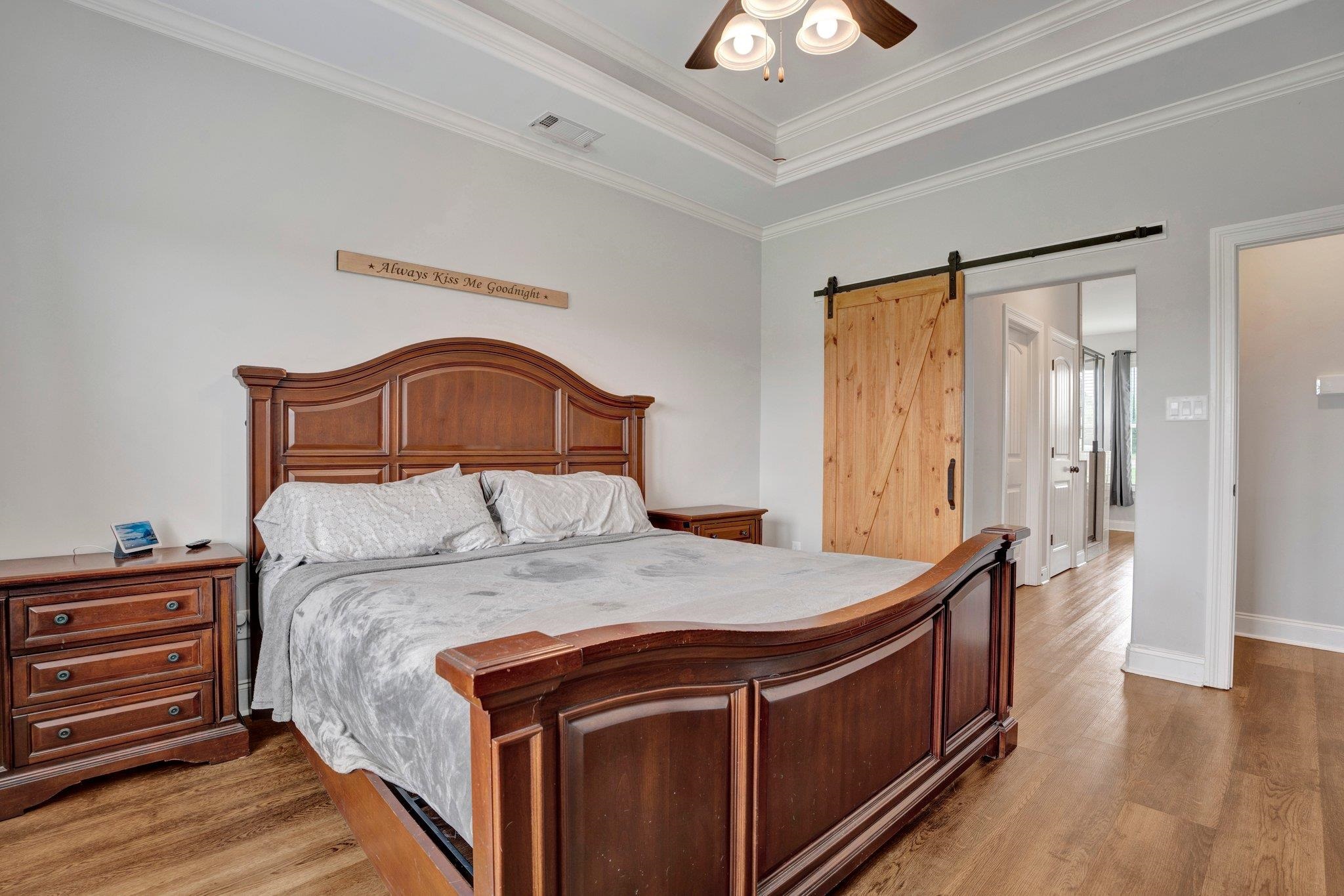 21 Trinity Cove Atoka, TN 38004 - Photo 12 of 21 a bedroom with a bed and a dresser