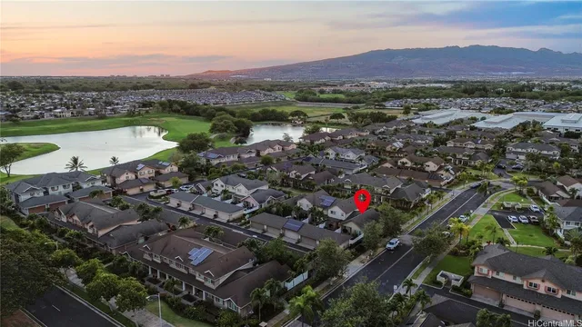 an aerial view of residential house with outdoor space and river