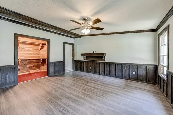 a view of entryway with wooden floor