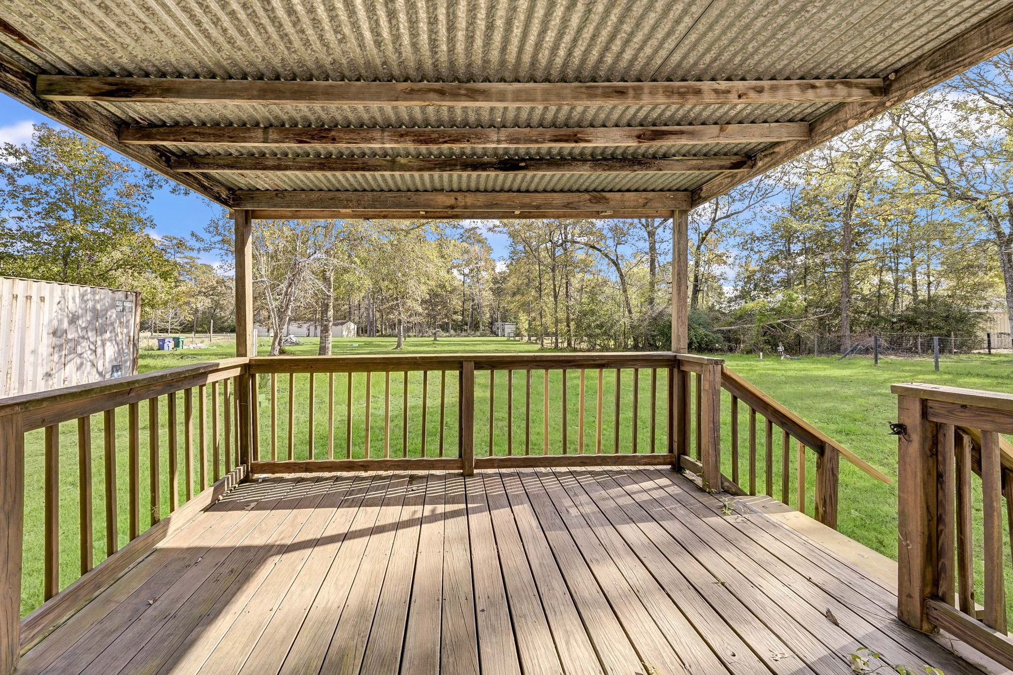 858 Big Hawg Road Trinity, TX 75862 - Photo 32 of 47 a view of balcony with wooden floor
