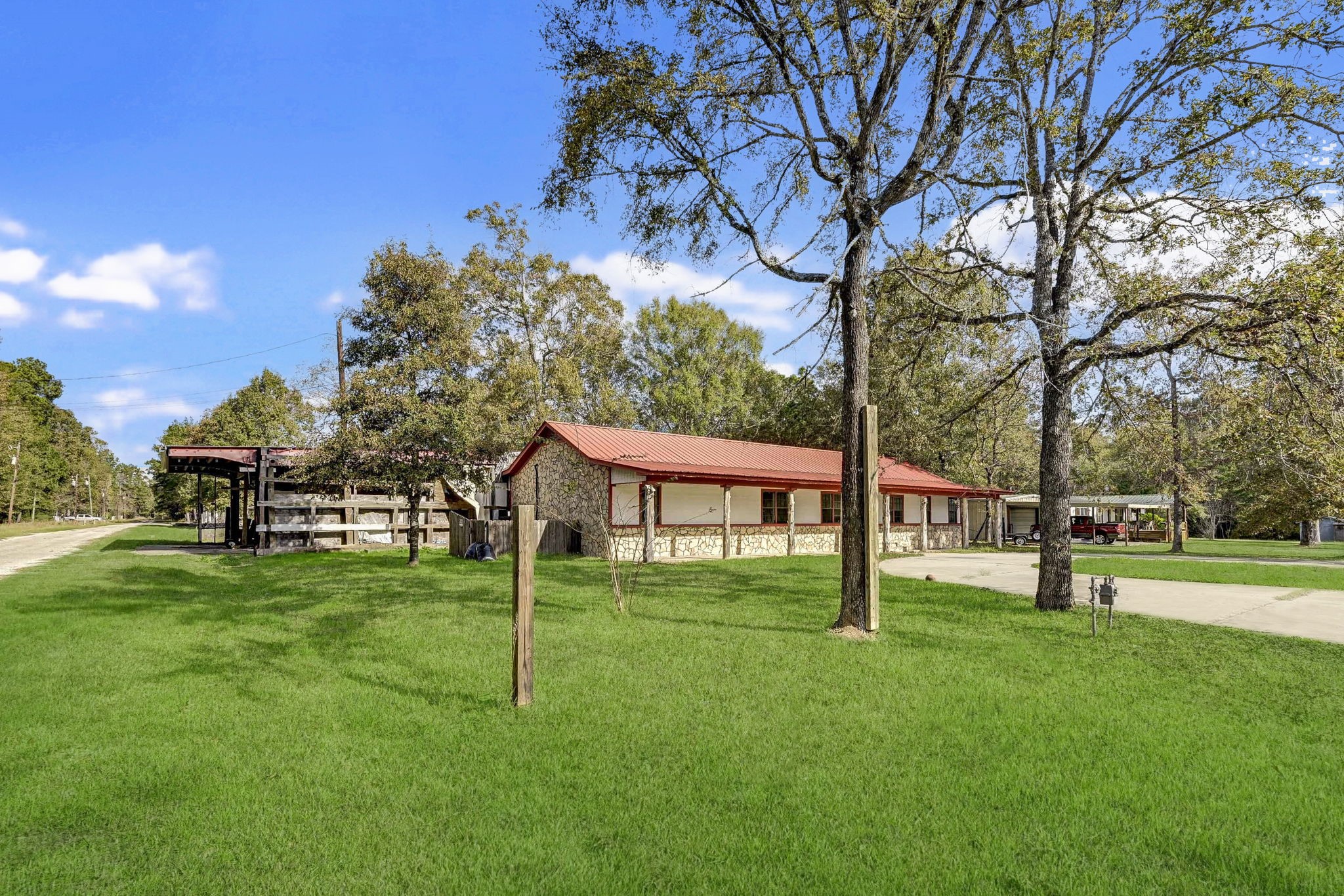 858 Big Hawg Road Trinity, TX 75862 - Photo 4 of 47 a view of a house with a backyard